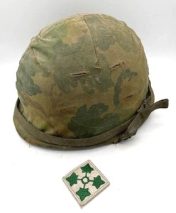 lot 73 image: Vietnam War 4th Infantry Division Combat Helmet Cover and Liner w 4th Infantry Patch