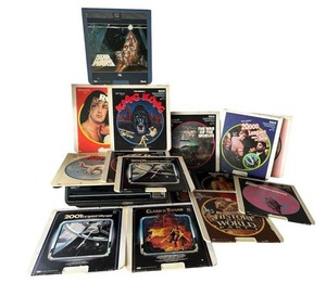 lot 106 image: RARE Vintage RCA SelectaVision CED VideoDisc Player (Model SFT 100 W) with Movies - Star Wars, Rocky, and More