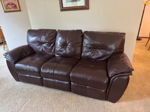 lot 14 image: Brown Leather Reclining Sofa with Tufted Cushions