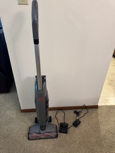 lot 49 image: Hoover Cordless Stick Vacuum with Battery and Charger