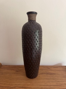 lot 62 image: Tall Brown Textured Ceramic Vase with Dimple Pattern