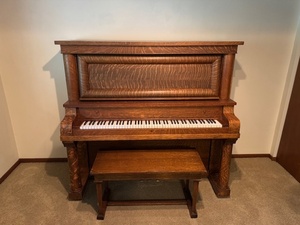 lot 132 image: Antique Upright Piano with Matching Bench and Tiger Oak Finish
