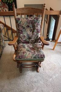 lot 10 image: Upholstered Wooden Glider Rocking Chair with Floral Cushions