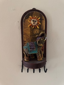 lot 154 image: Decorative Wall Hook with Elephant Figurine and Sun Motif