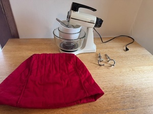 lot 177 image: Sunbeam Mixmaster Stand Mixer with Bowls, Attachments, and Red Cover