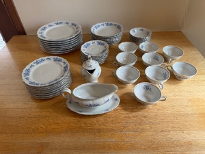 lot 182 image: Blue Floral Porcelain China Dinnerware Set with Plates, Bowls, Cups, and Serveware
