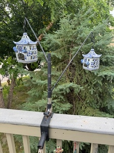 lot 186 image: Pair of Blue and White Ceramic Bird Feeders with Pagoda Design