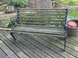 lot 1014 image: Vintage Outdoor Bench with Cast Iron Sides and Wooden Slats