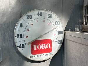 lot 1018 image: Vintage Toro Quality Service Advertising Thermometer