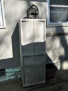 lot 1022 image: Outdoor Storage Cabinet with Contents and Decorative Birdcage