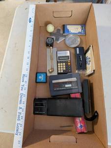 lot 262 image: Assorted Vintage Electronics, Calculator, Watch, and Collectibles Lot