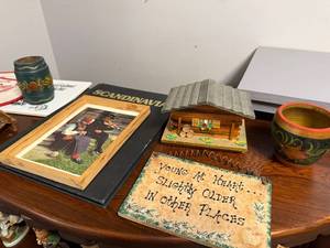 lot 141 image: Scandinavian Decor Collection with Book, Figurines, and Folk Art Pottery