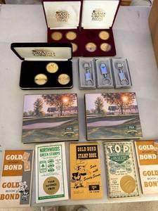 lot 207 image: Gold Bond Stamp Books, PGA 2002 Keepsakes, Token Keychains and Grand Casino Collectible Coins Set