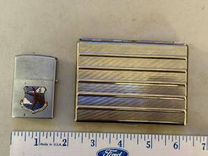 lot 210 image: Vintage Cigarette Case with 3917 Installations Squadron Lighter