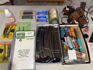 lot 214 image: N Scale Model Train Set Collection with Tracks, Cars, Switches, Transformers, and Scenery Parts