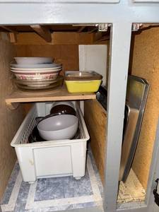 lot 280 image: Assorted Kitchenware Lot with Bowls, Baking Dishes, Trays, and Flatware