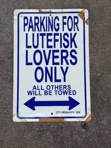 lot 453 image: Parking for Lutefisk Lovers Only Metal Sign