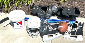 lot 161 image: Mixed Youth Sports Equipment Lot - Baseball, Hockey, and Football Gear