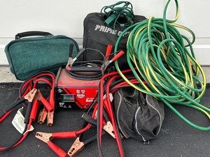 lot 168 image: Automotive Emergency Kit with Husky Battery Charger, Jumper Cables, Extension Cords, and Accessories