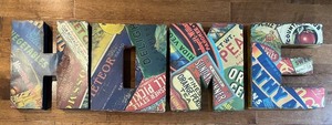 lot 19 image: Vintage-Style Metal Wall Letters Spelling HOME with Produce Label Collage