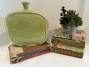lot 26 image: Vintage Green Ceramic Vase, Artificial Plant, and Collection of Classic Books