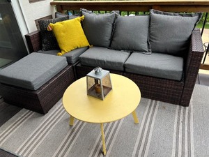 lot 29 image: Outdoor Wicker Patio Sectional Sofa Set with Cushions, Table, Pillows, and Rug
