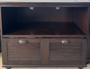 lot 41 image: Pottery Barn Dark Wood Media Console with Sliding Doors