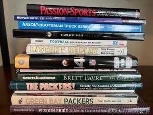 lot 78 image: Sports and Football Book Lot with Brett Favre DVD