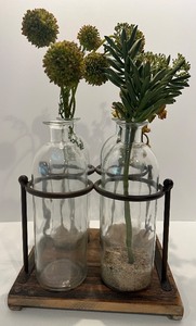 lot 98 image: Decorative Glass Bottle Vase Set with Faux Greenery and Metal Stand