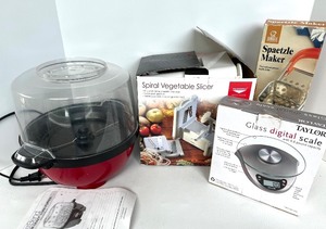 lot 54 image: Kitchen Appliance and Gadget Set Popcorn Popper, Spiral Slicer, Spaetzle Maker, and Glass Digital Scale