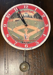 lot 64 image: Timeworks Storytime Collection Baseball Pendulum Wall Clock