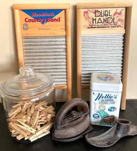 lot 124 image: Vintage Laundry Collection with Washboards, Glass Jar of Clothespins, Iron, and Laundry Soda