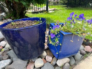 lot 133 image: Pair of Blue Glazed Ceramic Planters, One with Purple Flowers
