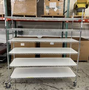 lot 7 image: MSRP $2400 Like New High Quality Heavy Duty&nbspTechnibilt Shelving System&nbspTSS 6 Tier Stainless Steel Chrome Finish NSF Wire Storage Cart Truck With Locking Casters 80x72x24 Up to 850 lbs per shelf