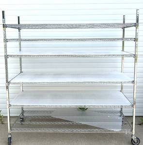 lot 14 image: MSRP $2400 Like New High Quality Heavy Duty&nbspCari-All Healthcare Shelving System 6 Tier Stainless Steel Chrome Finish NSF Wire Storage Cart Truck With Locking Casters Up to 850 lbs per shelf