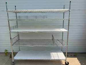 lot 15 image: MSRP $2000 High Quality Heavy Duty&nbspInterMetro Super Erecta Shelving System 5 Tier Stainless Steel Chrome Finish NSF Wire Storage Cart Truck With Locking Casters 80x72x24 Up to 800 lbs per shelf - Good Condition