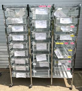 lot 19 image: MSRP $5000 Like New Technibilt SmartCell HD High Density Storage System Cart With 25 Slide Out Baskets With Locking Wheels - This Fantastic High Quality Cart has all of its wheels - Contents In Baskets Not Included.