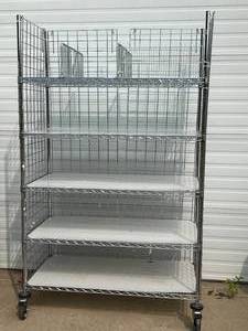 lot 29 image: MSRP $1800&nbspLike New High Quality Heavy Duty&nbspTechnibilt Shelving System&nbspTSS 5 Tier Stainless Steel Chrome Finish NSF Wire Storage Cart Truck With Locking Casters & Bumper Guards 80x48x24 Up to 600 lbs per shelf