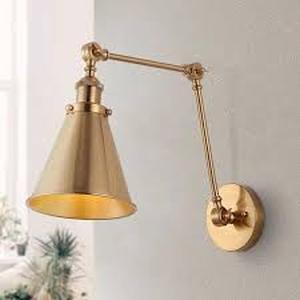 lot 26 image: JONATHAN Y Rover 7 in. Adjustable Arm Metal Brass LED Wall Sconce    Customer Returns See Pictures