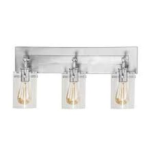 lot 46 image: Hampton Bay Regan 21 in. 3-Light Brushed Nickel Bathroom Vanity Light with Clear Glass Shades   Customer Returns See Pictures