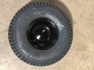 lot 37 image: Cub Cadet Original Equipment 20 in. Rider Rear Wheel Assembly with Black Rim OEM# 634Z0104-0637 Customer Returns See Pictures