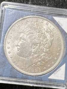 lot 08 image: 1885-O US MORGAN SILVER DOLLAR IN CASE