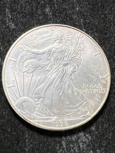 lot 23 image: 1998 AMERICAN SILVER EAGLE 1 TROY OZ .999 FINE SILVER