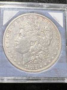 lot 64 image: 1882 US MORGAN SILVER DOLLAR IN CASE