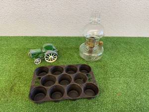 lot 9 image: Cast Iron Muffin Pan, Lantern, John Deere Tractor