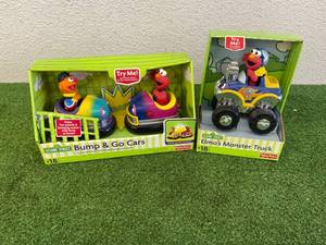 lot 24 image: Bump & Go Cars & Elmos Monster Truck