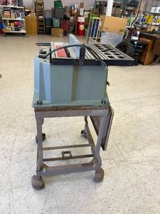 lot 140 image: Delta 10 Table Saw on Rolling Steel Cart