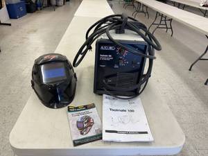 lot 150 image: Toolmate 100 Auto Arc Wire Welder & Helmet