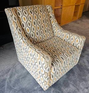lot 37 image: Playful Contemporary Swivel Accent Chair