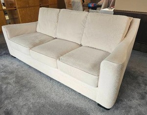lot 38 image: Klaussner Furniture Plush Cream Upholstered 3 Cushion Sofa